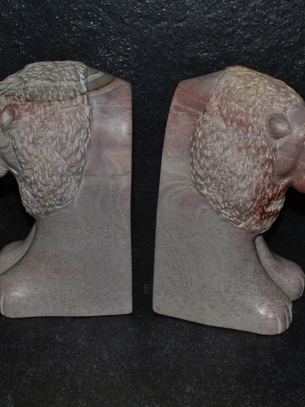 Fermalibro leone in pietra