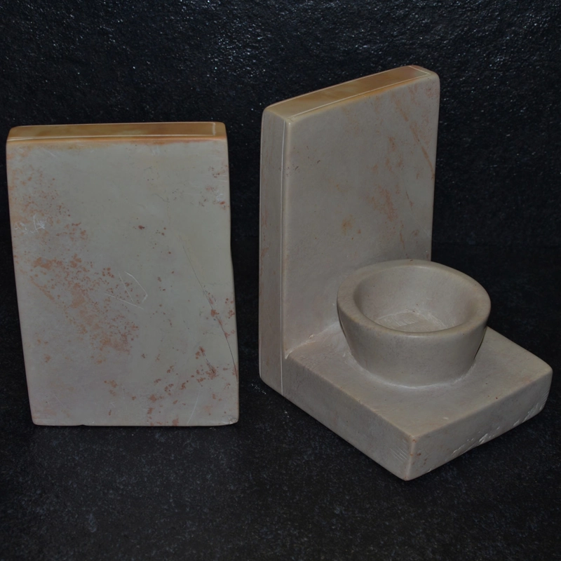 Fermalibro ciotola in pietra