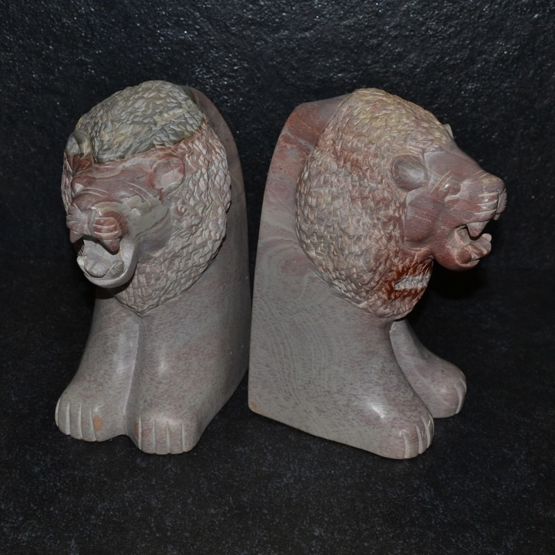 Fermalibro leone in pietra