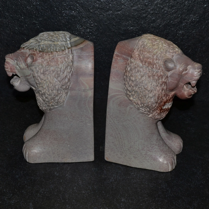 Fermalibro leone in pietra